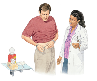 Man giving himself injection in skin of abdomen. Healthcare provider is standing next to him.